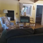 Living and dining area inside the suite